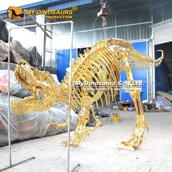 Hanging-golden-t-rex-skeleton Hanging-golden-t-rex-skeleton