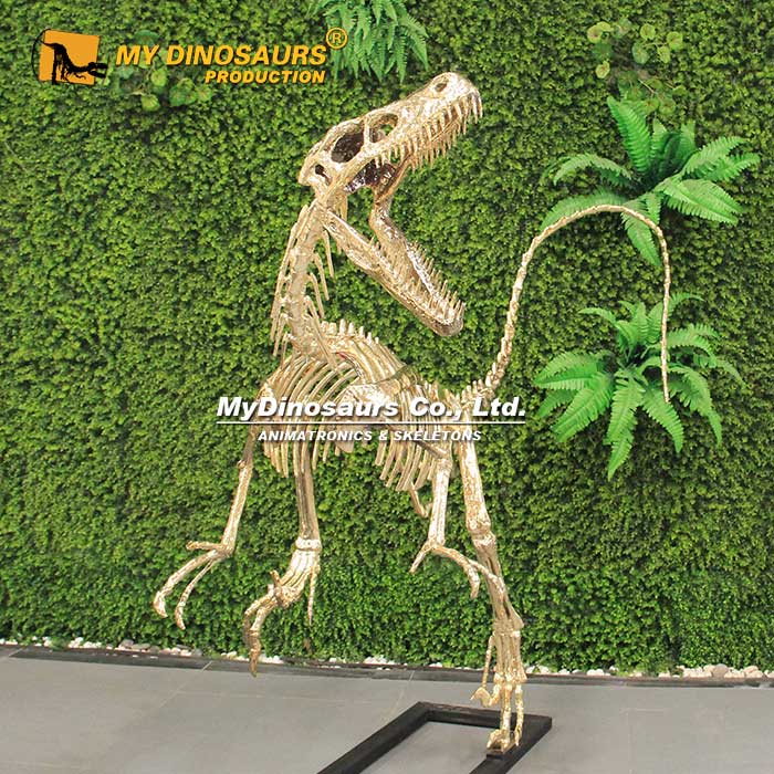 gold-raptor-skeleton-statue-2 gold-raptor-skeleton-statue-2