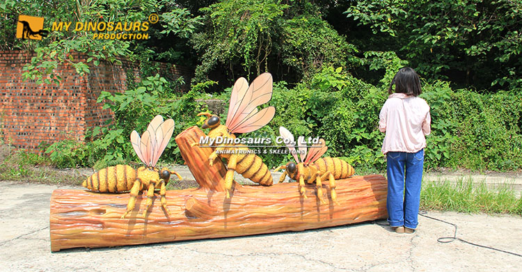 Animatronic Yellow Bees on Log
